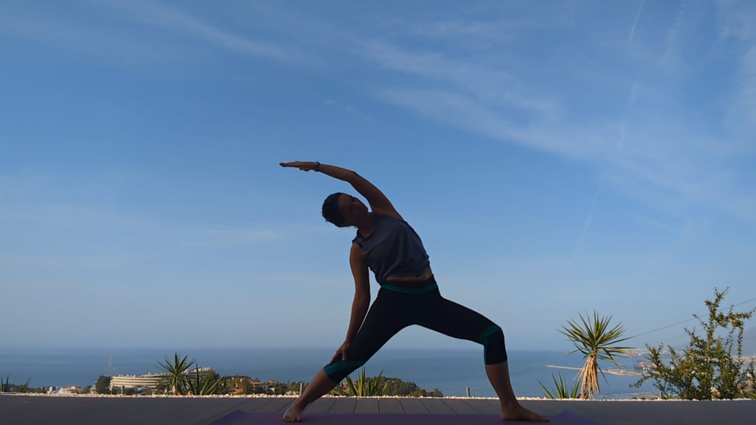 Yoga teacher practising in Málaga